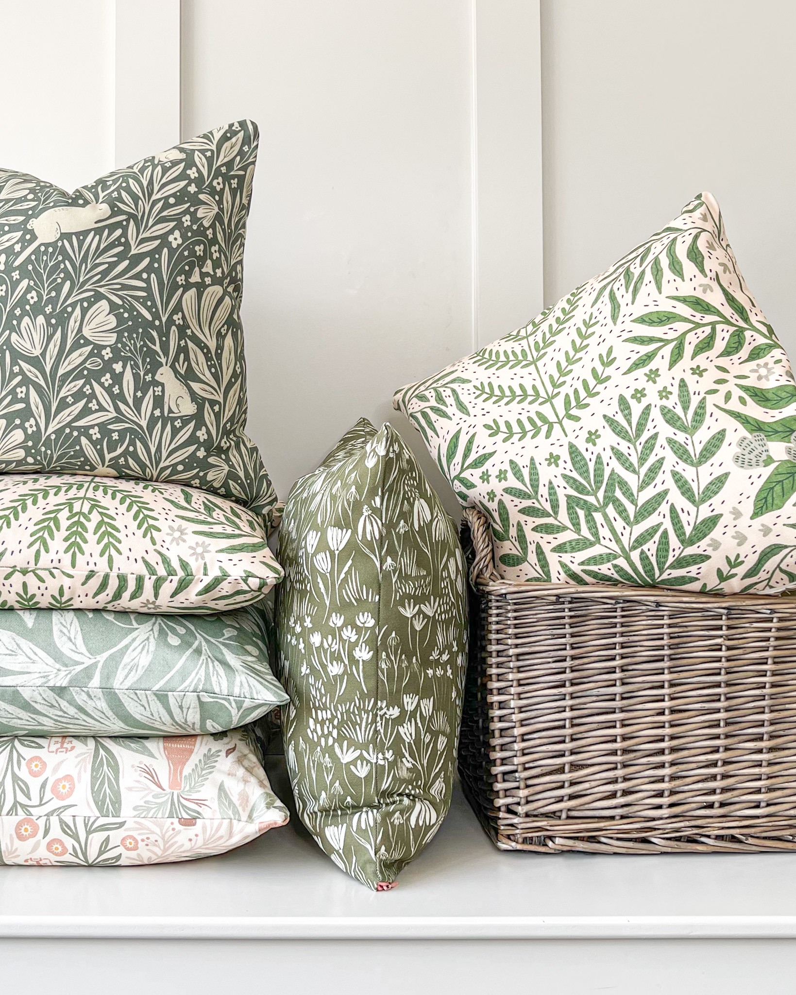 Handcrafted UK-made decorative, scatter, and accent cushions with nature-inspired designs and high-quality materials, perfect for seasonal living.