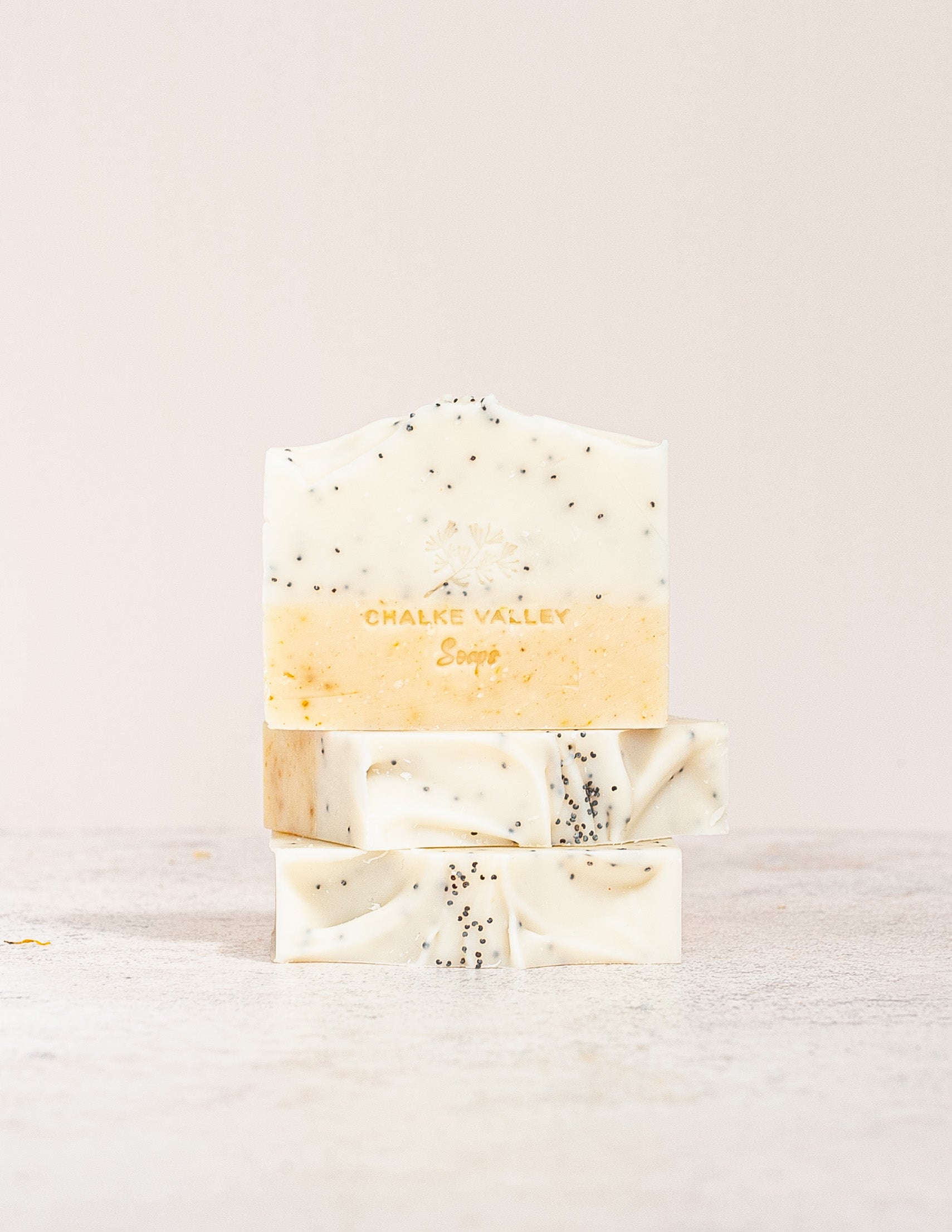 Natural essential oil botanical zesty soap bar with poppy seeds made in the UK