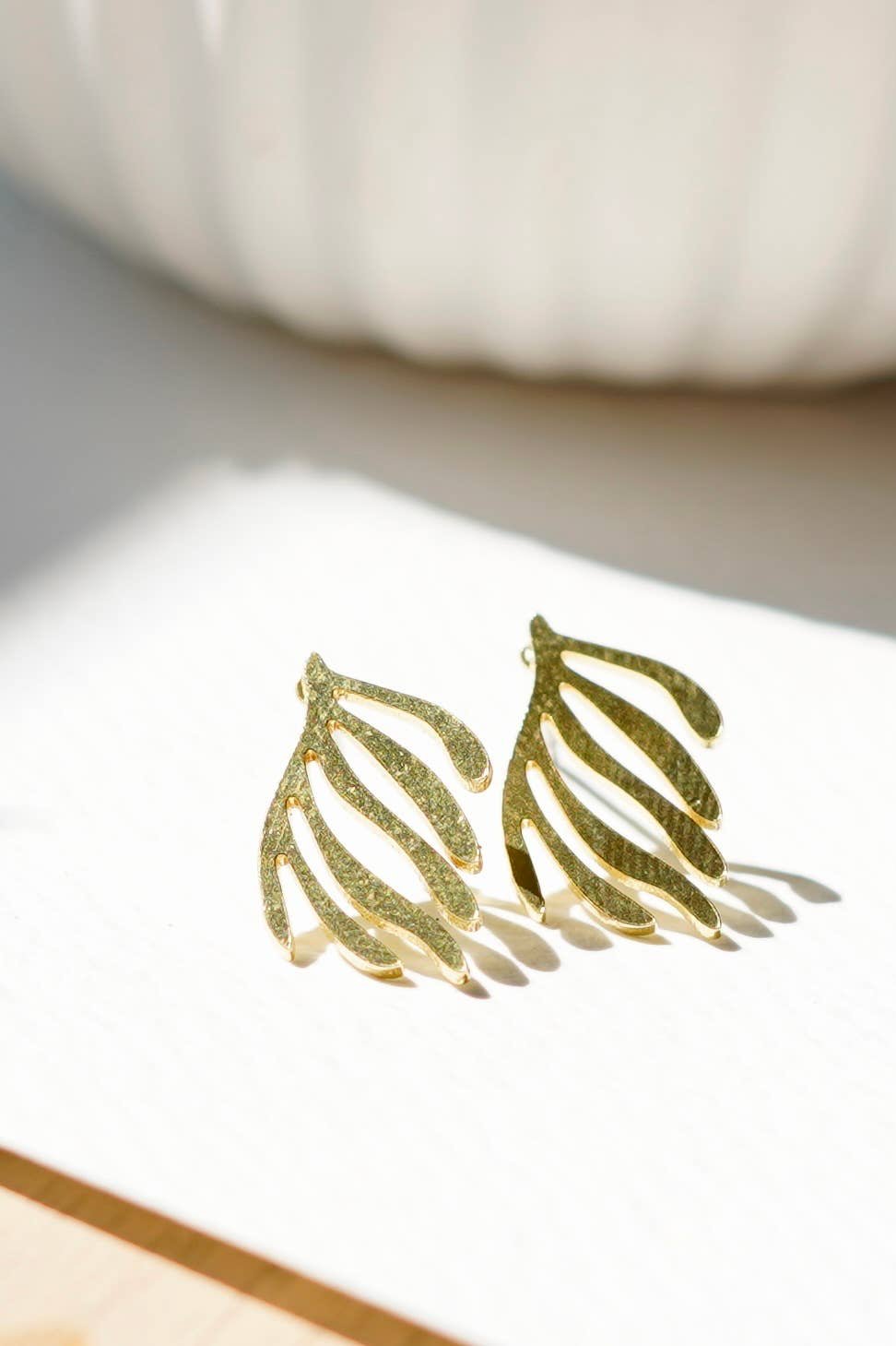 Fern stud earrings in brass gold. Ready to gift 