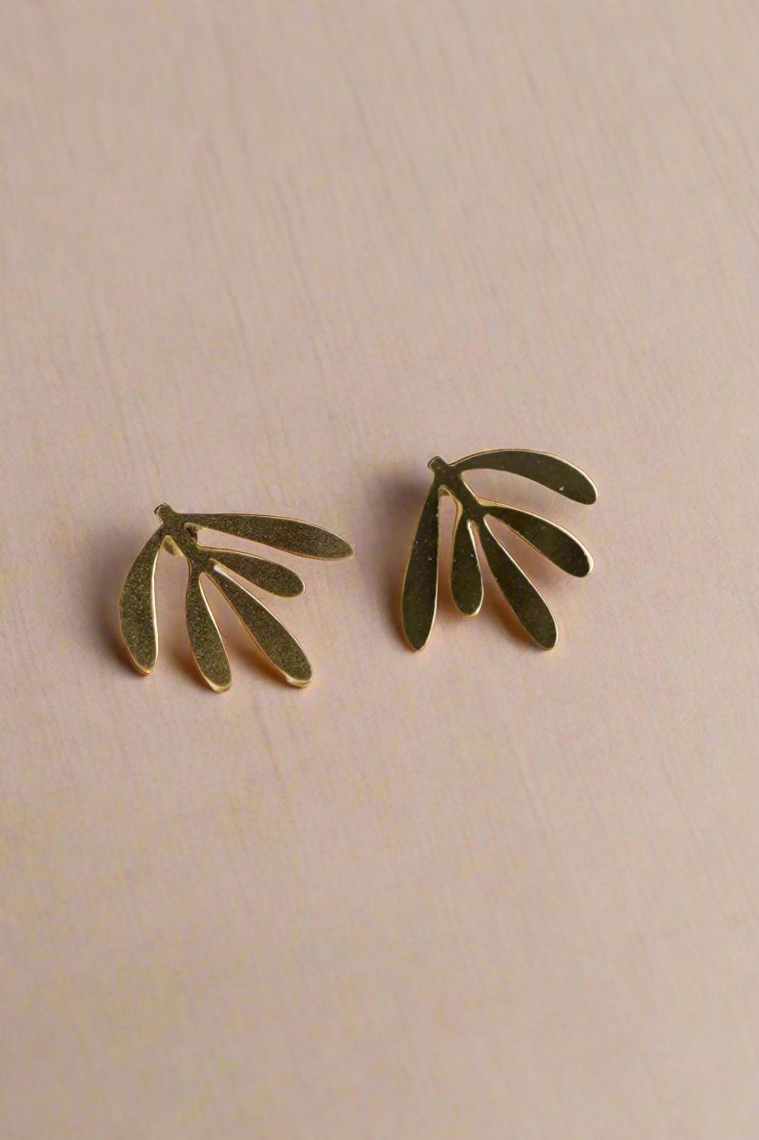 Handcrafted Leaf Stud Earrings for autumn and winter, made in the UK. Delicate laser-cut brass design with hypoallergenic stainless steel posts. Lightweight and gift-ready in a cotton pouch.