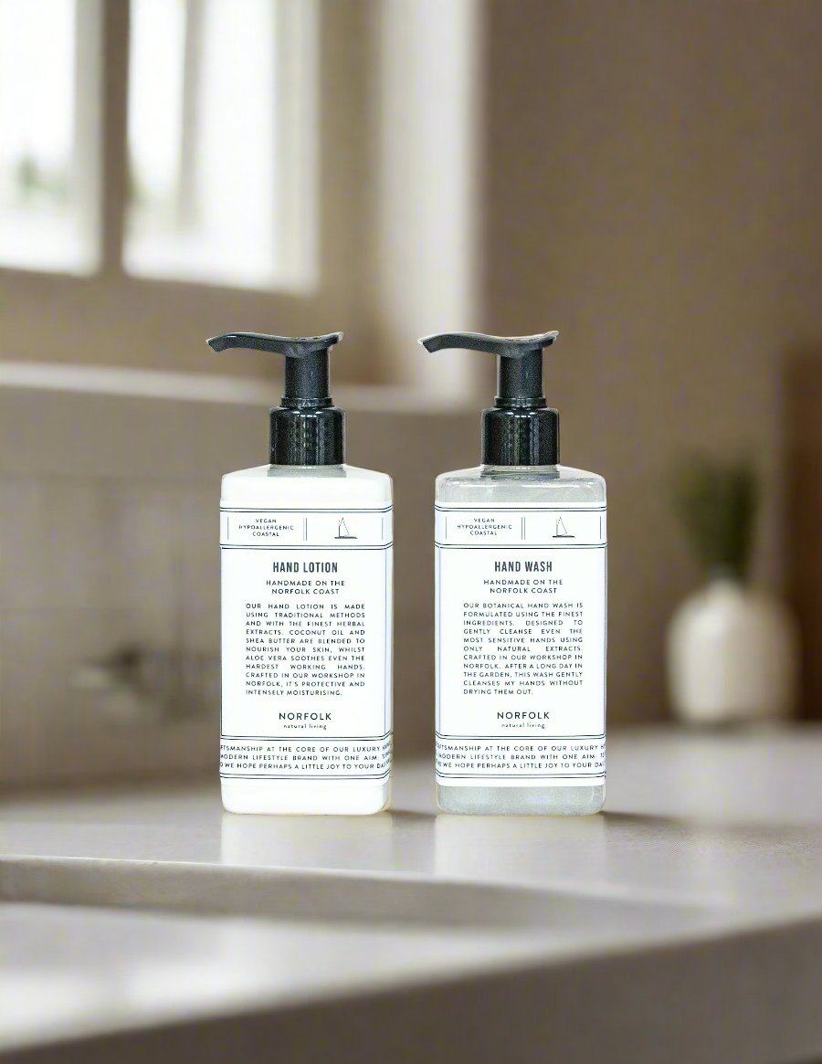 Norfolk Natural Living Coastal Walks Hand Care Set with organic hand wash and hand cream. Features a fresh coastal fragrance, vegan and eco-friendly, presented in elegant packaging.