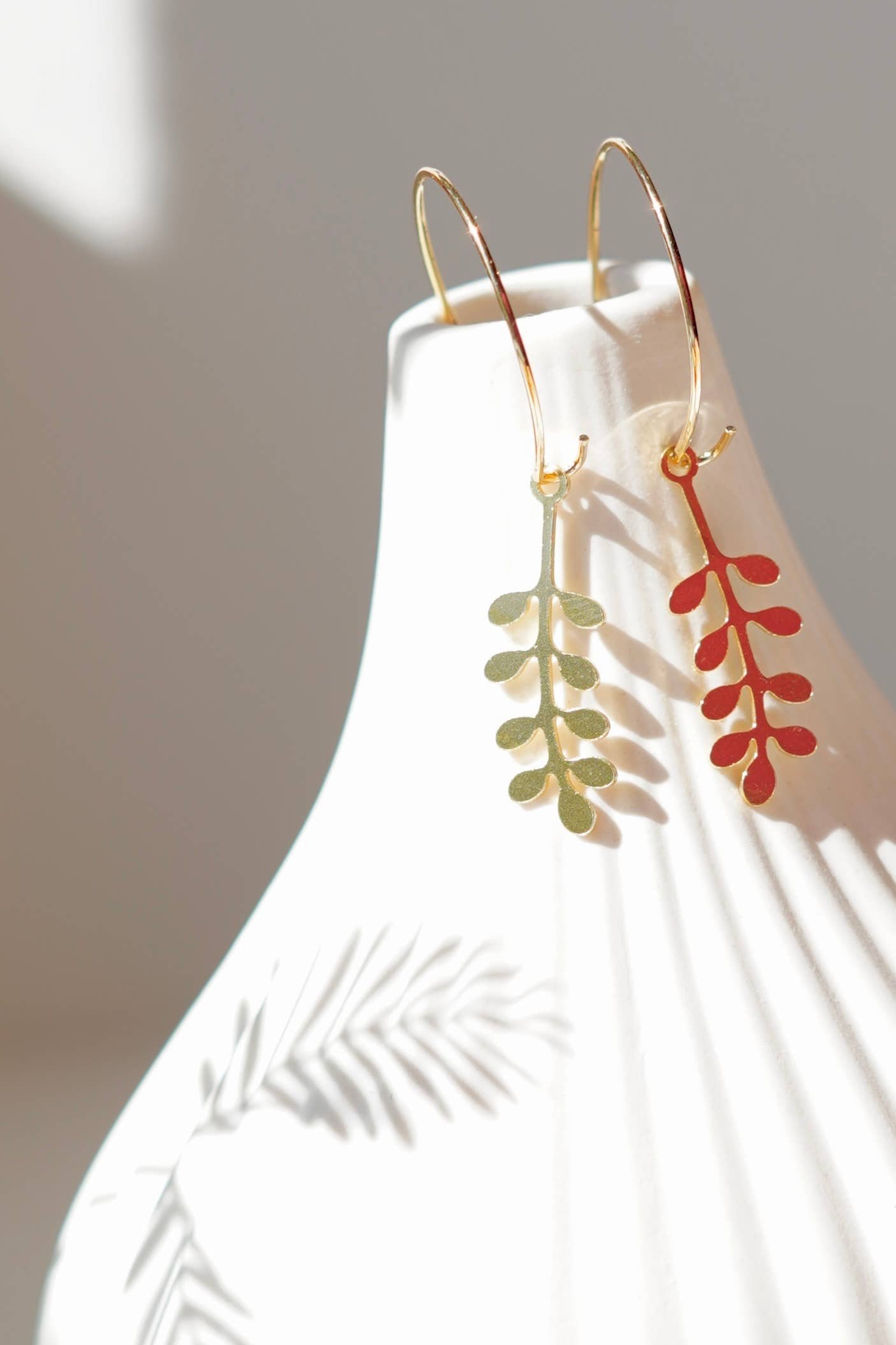 Handcrafted Sprig Hoop Earrings for autumn and winter, made in the UK. Delicate brass sprigs on 20mm gold-plated hoops. Lightweight and gift-ready in a cotton pouch.