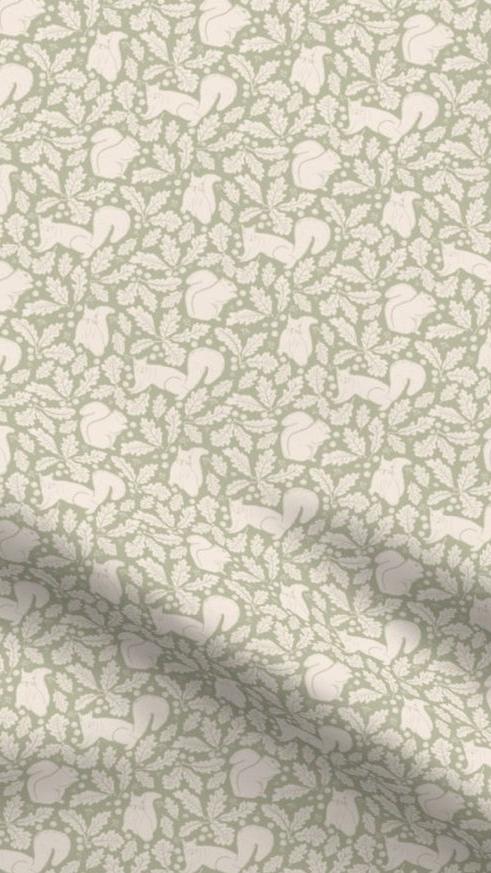 Squirrels in the Oaks fabric designed by Sophie Benoit of River Oak Studio, featuring white illustrations of squirrels, oak leaves, and acorns on a sage green background, ideal for eco-friendly home decor cushions and lampshades.